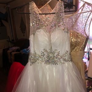 Beautiful white dress with silver details.